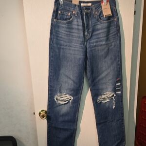 Levi's Relaxed Fit Blue Jeans with Distressed Details